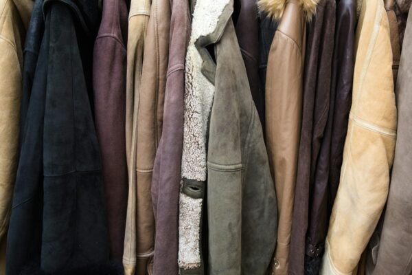 Jackets Leather jackets hanging on a workshop rail